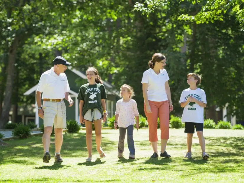 philip and sheri ross walking with three kids