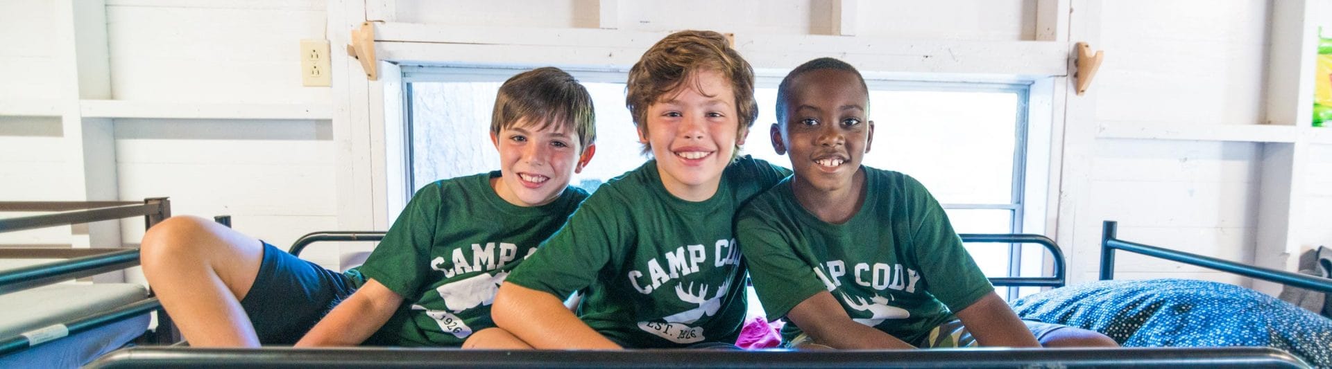 three boys at summer camp