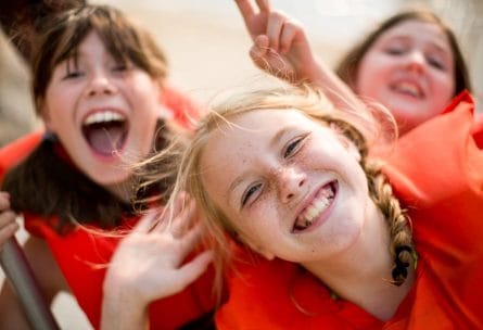 girls smiling at camp