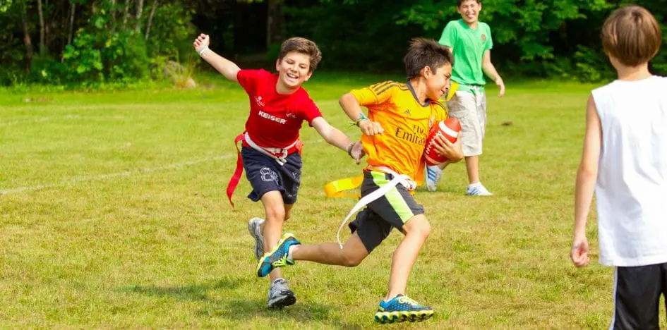 boys playing flag football