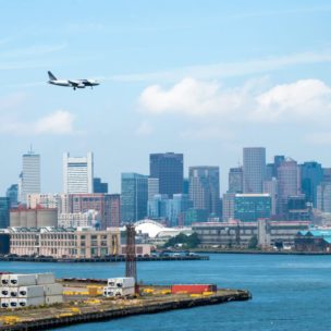 airplane flying over boston