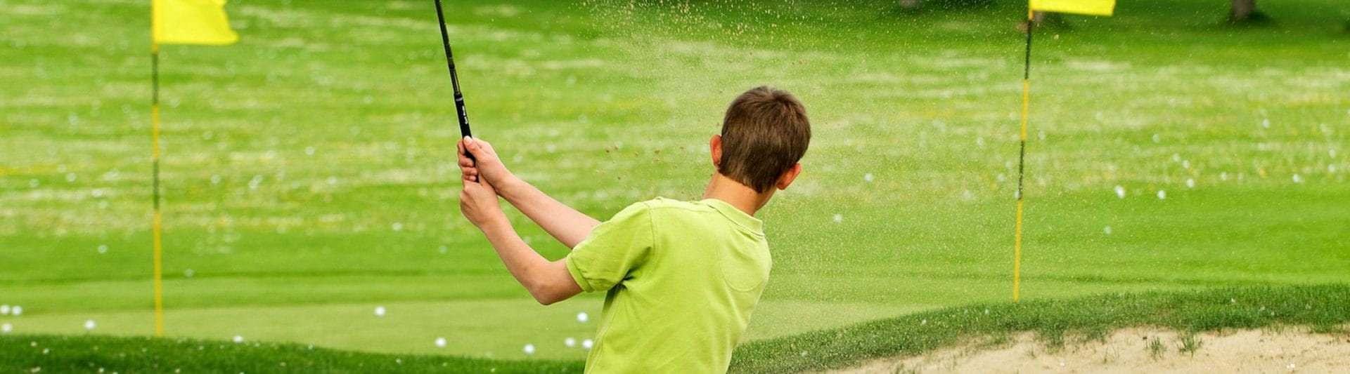 boy golfing