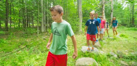 kids hiking at summer camp