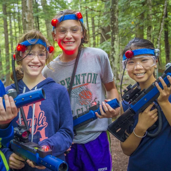 girls playing laser tag