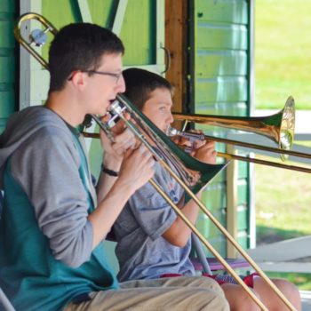 boys playing trumpets