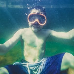 young boy underwater