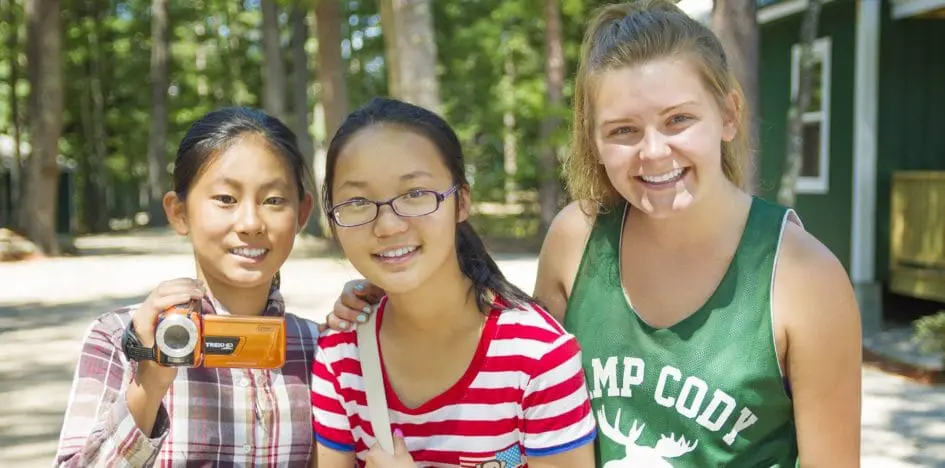 three girls smiling