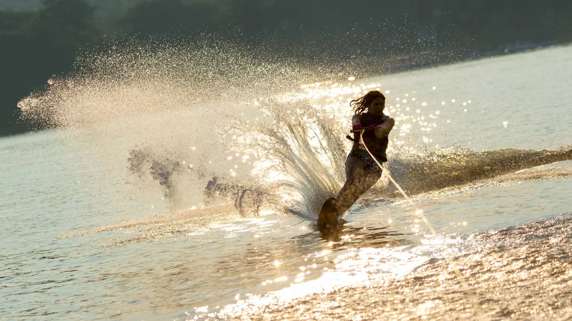 young boy wakeboarding