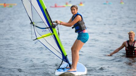 girl windsurfing