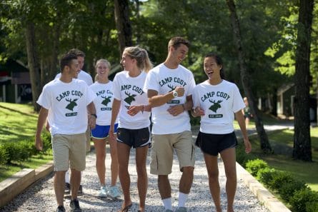 group of counselors walking together and smiling