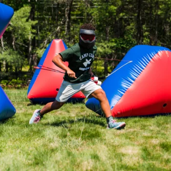 boy playing archery tag.