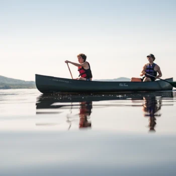 two boys canoeing.