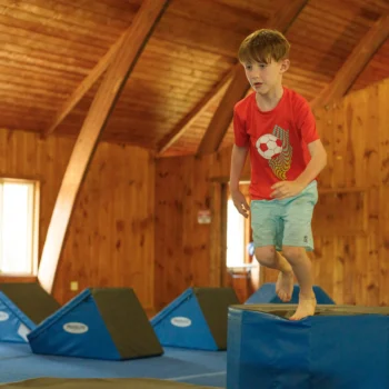 boy performing gymnastics.
