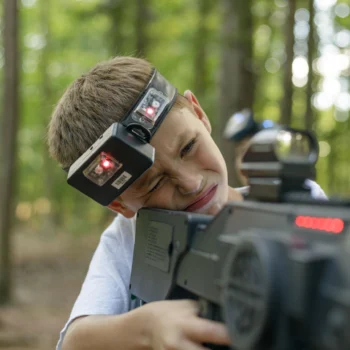 boy playing laser tag.